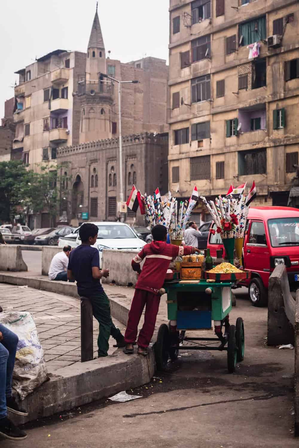 Kids selling candy right outside the gates to Old Cairo.