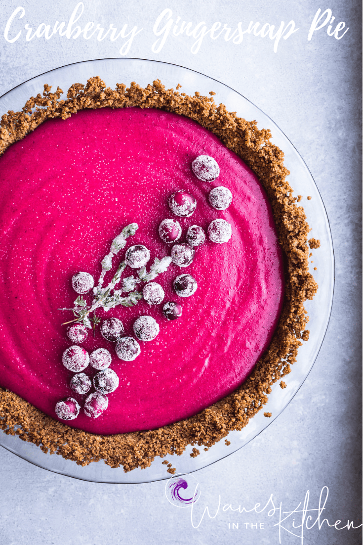 Cranberry Gingersnap Pie. Topped with sugared cranberries and sugared thyme. overhead shot, on a white background, left side cut off.