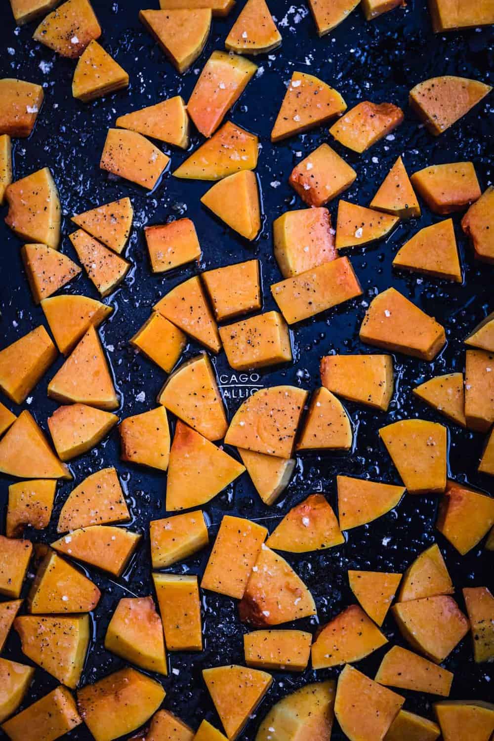 Cut up squash, on a baking sheet, pre-oven.