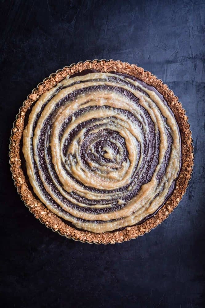 Finished tart with tahini swirl, overhead shot.