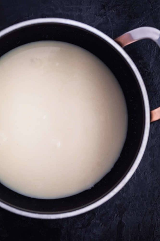 Cream, vanilla and sweetener heated in a saucepan.