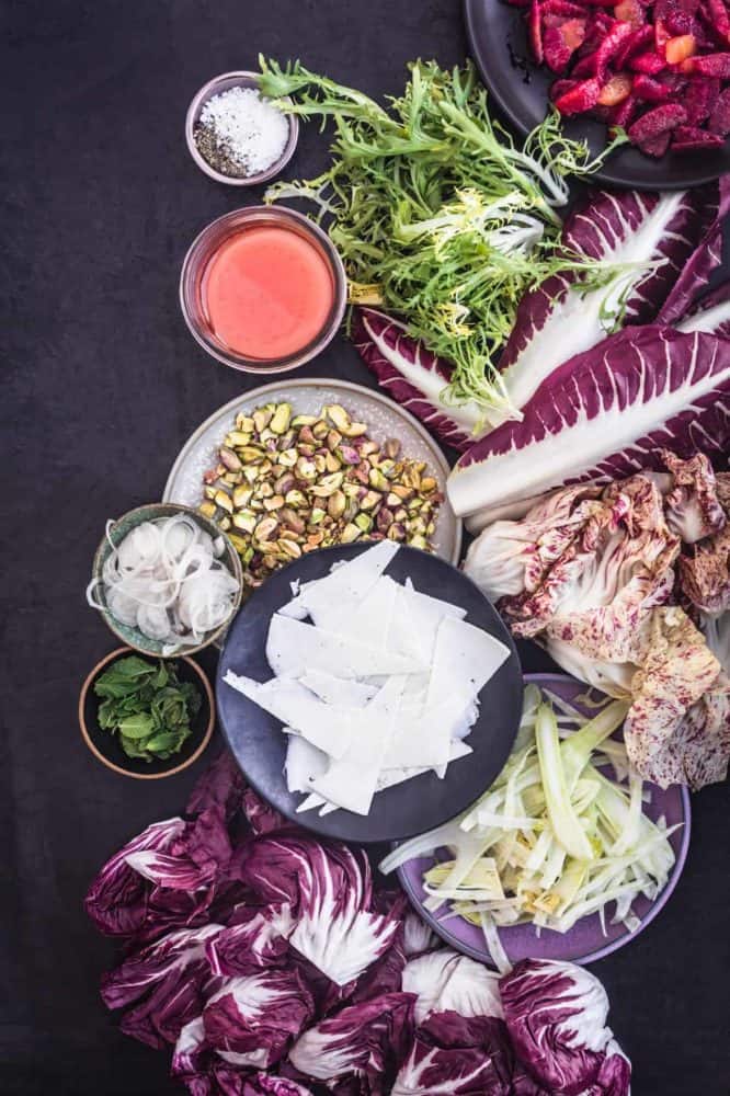 Ingredient shot with blood oranges, fennel, chicories, pistachios, shallots, mint, the vinaigrette, salt and pepper.