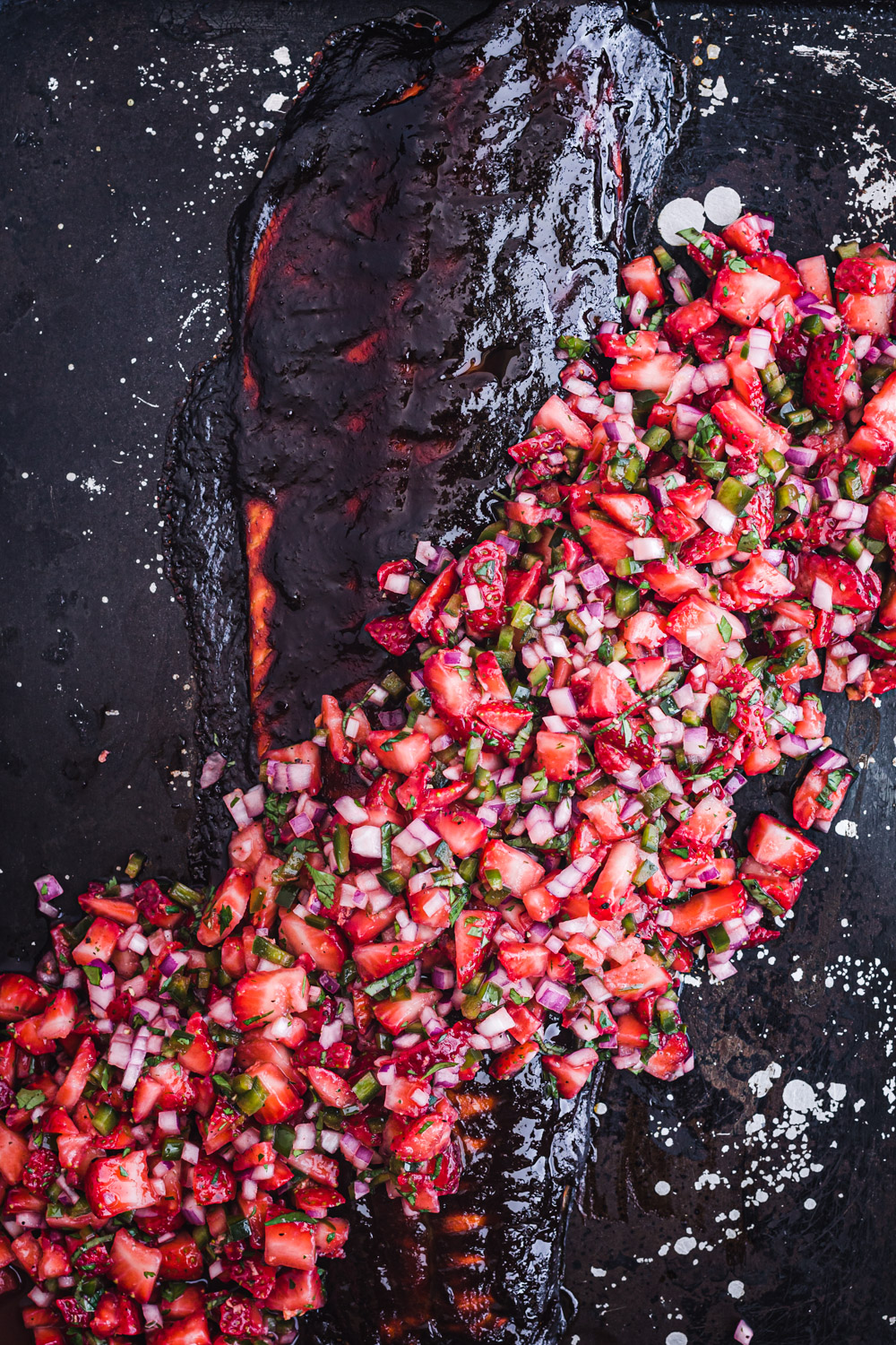 Salsa negra salmón with strawberry salsa.