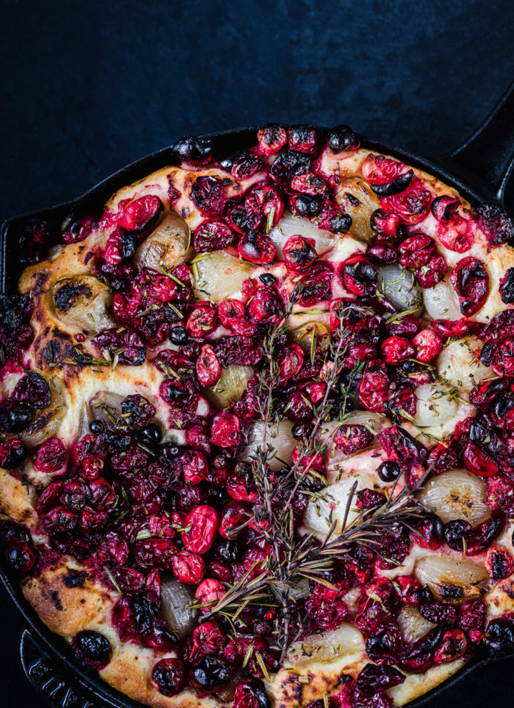 Rosemary Cranberry Focaccia with Caramelized Shallots just out of the oven, overhead shot.