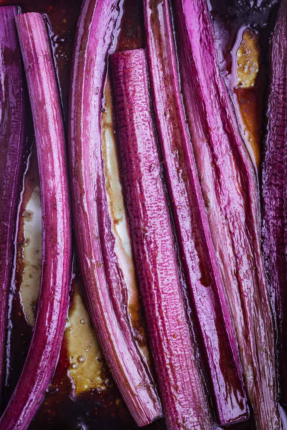 rhubarb stalks after being roasted in the oven; overhead shot.