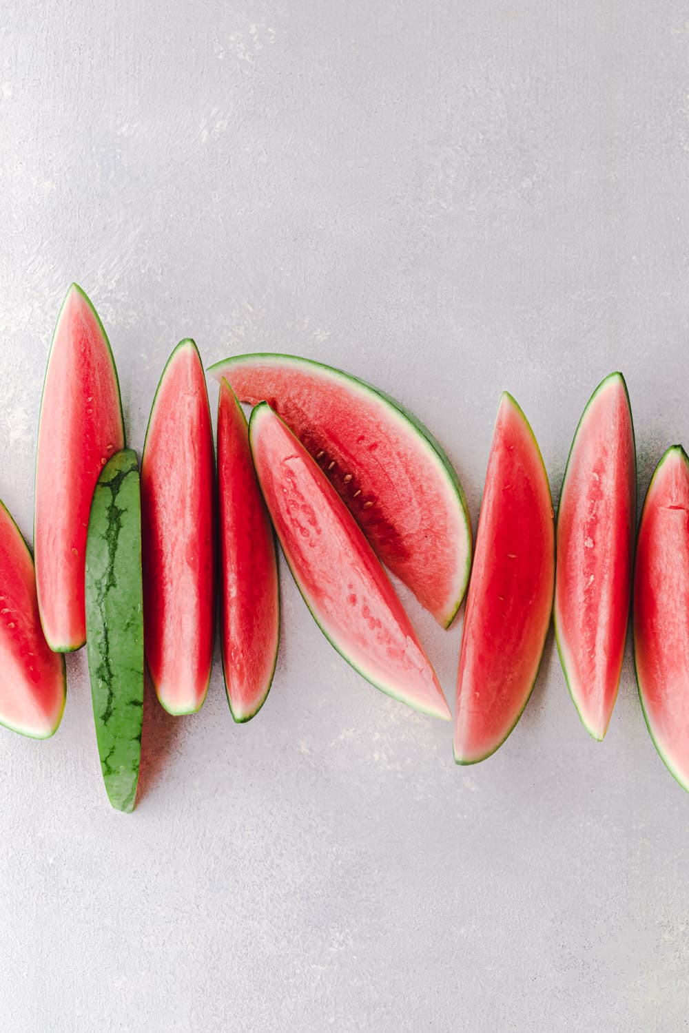 pink watermelon slices on a light background